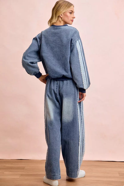 Women's washed denim jeans with lace side panel detailing, relaxed fit silhouette, and vintage-inspired finish by BiBi. full back view