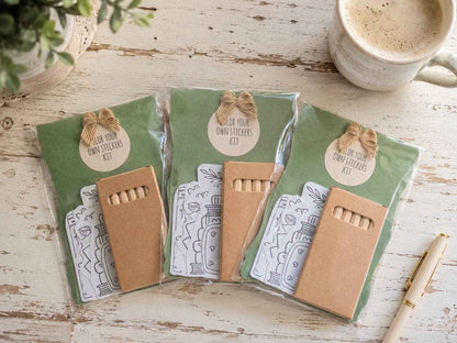 The Paper Garden Gardening color-your-own sticker kit featuring illustrated gardening stickers and colored pencils