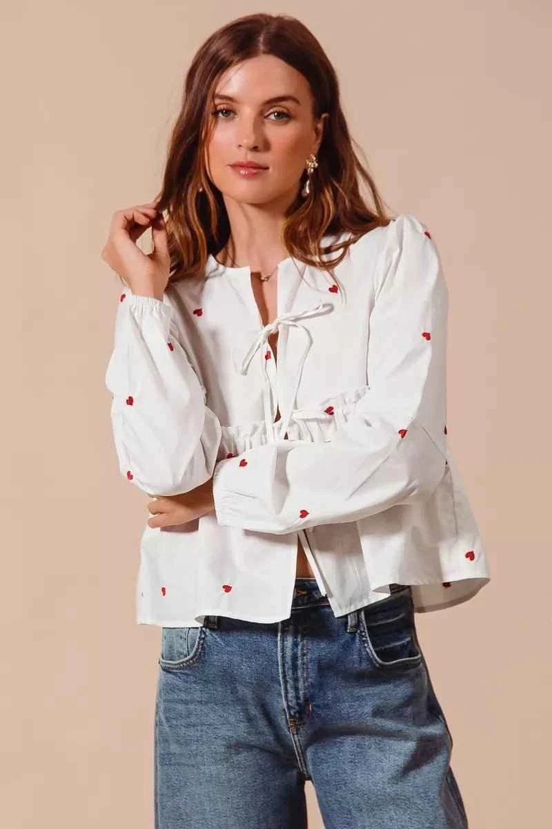 Ivory Front Tie Heart Embroidered Blouse With Puff Sleeve by So Me