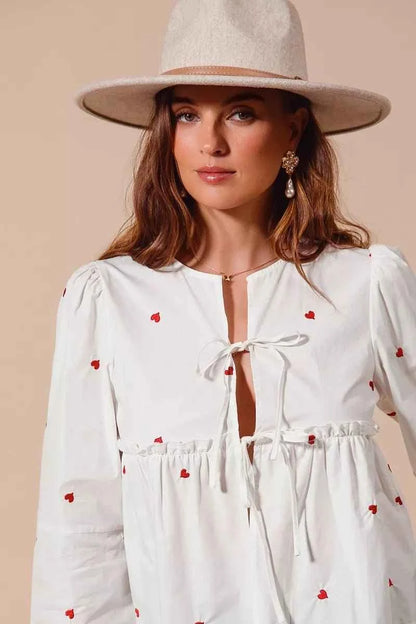 Ivory Front Tie Heart Embroidered Blouse With Puff Sleeve by So Me